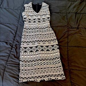Elegant Black and White Patterned Dress by Bebe